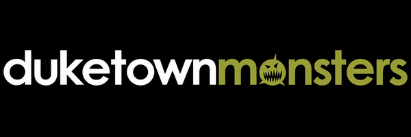 Duketown Monsters white and olive logo with black fish details